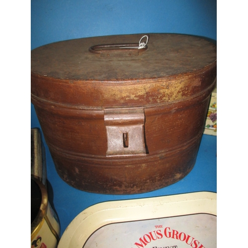 53 - A quantity of vintage tins, to include a hat box and pub tray, all in used condition