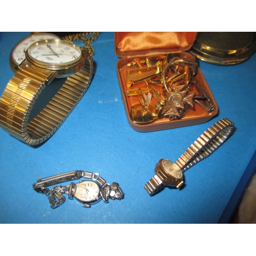 56 - A large quantity of general clearance items, to include watches and powder compacts, all in used con... 