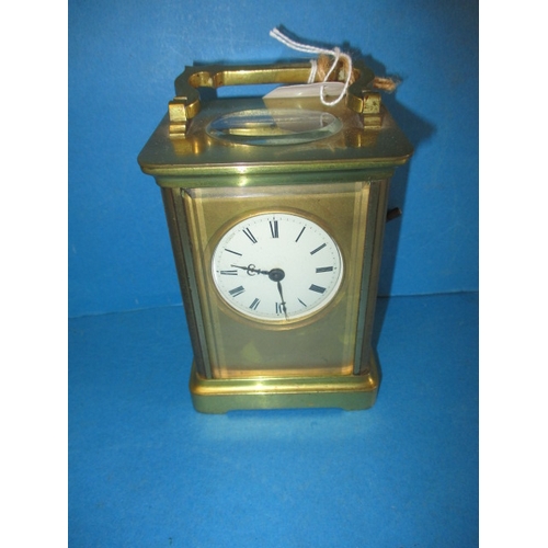 57 - A vintage 5 glass carriage clock, in current working order, one glass cracked and with general age-r... 