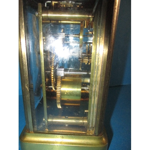 57 - A vintage 5 glass carriage clock, in current working order, one glass cracked and with general age-r... 