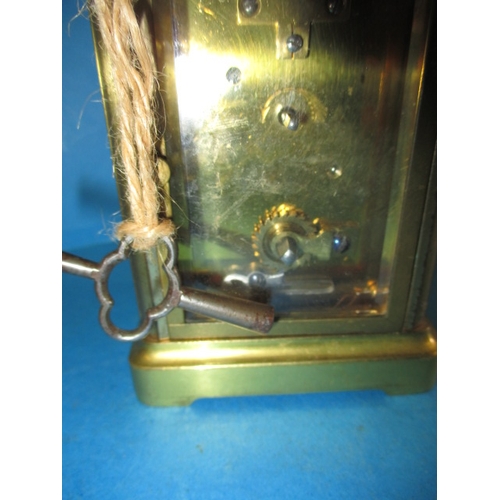 57 - A vintage 5 glass carriage clock, in current working order, one glass cracked and with general age-r... 