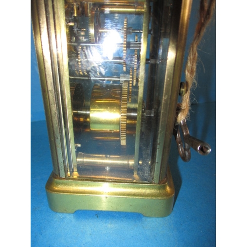 57 - A vintage 5 glass carriage clock, in current working order, one glass cracked and with general age-r... 