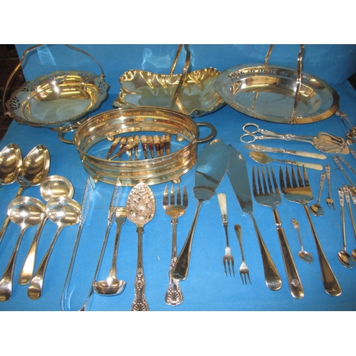 58 - A quantity of vintage plated items, to include a dish ring and ladles, all in useable pre-owned cond... 