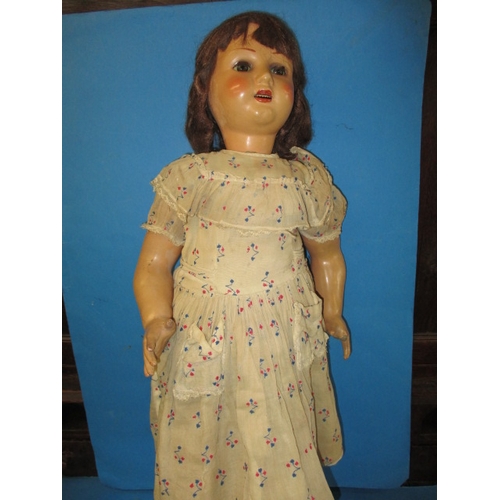 61 - A large 1930s composite doll, approx. height 89cm, some fingers missing from left hand and general a... 