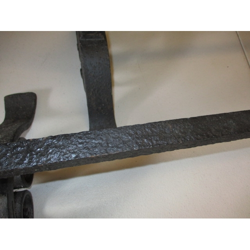 66 - Two large wrought iron log lifters, suitable for an inglenook fireplace, in good used condition