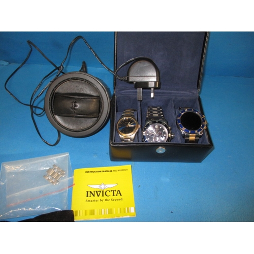 67 - A watch winder and 3 watches, to include an INVICTA, all in used condition and not tested as to func... 