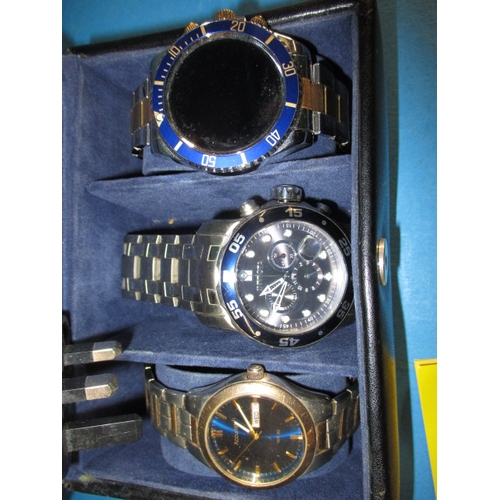 67 - A watch winder and 3 watches, to include an INVICTA, all in used condition and not tested as to func... 