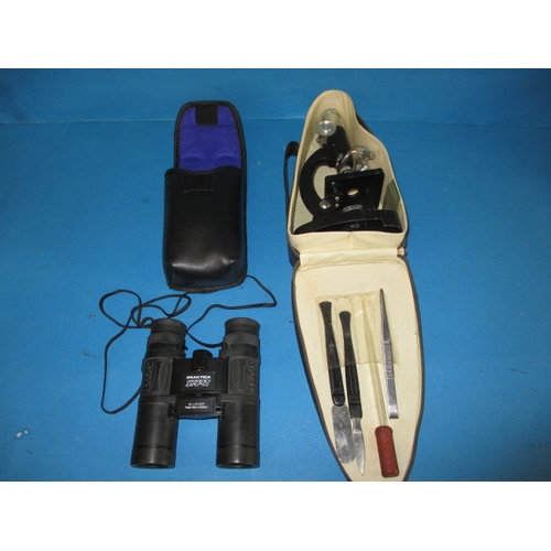 69 - A pair of Praktica sport binoculars and a travelling microscope, both in useable pre-owned condition