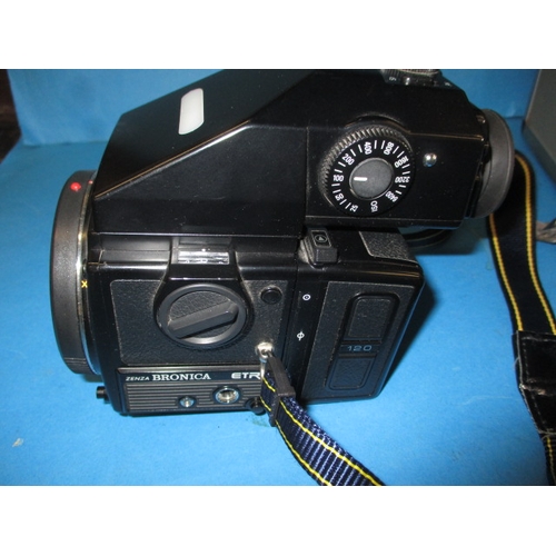 72 - A Bronica ETR Si 120 camera, in hard case with lenses and other accessories, in good used condition,... 