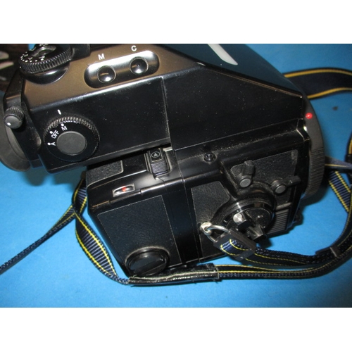 72 - A Bronica ETR Si 120 camera, in hard case with lenses and other accessories, in good used condition,... 