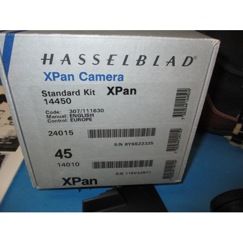 73 - A Hasselblad XPan camera, in soft kit bag with accessories, in good used condition, not tested as to... 