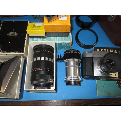 74 - A large quantity of vintage cameras and accessories, various makers and ages, none tested as to func... 