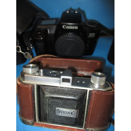 74 - A large quantity of vintage cameras and accessories, various makers and ages, none tested as to func... 