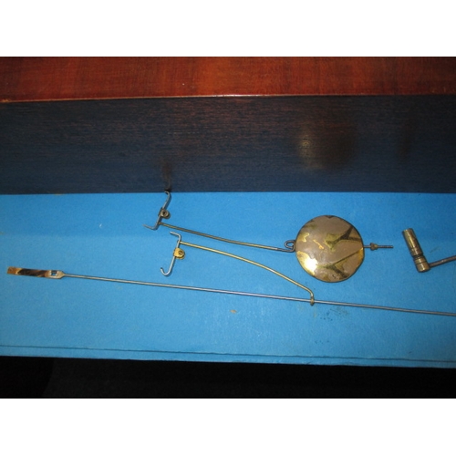 82 - A vintage Ansonia wall clock, with pendulum, weights and key, not tested as to function