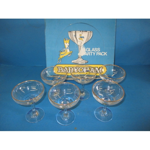 87 - A boxed set of 6 Babycham glasses, the glasses are unused, the box has minor age-related marks