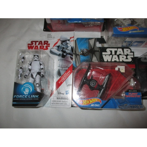 102 - A quantity of Star Wars Hot Wheels and Force Link collectables, all in original packaging