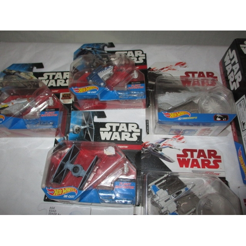 102 - A quantity of Star Wars Hot Wheels and Force Link collectables, all in original packaging