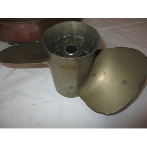 109 - A vintage copper starboard ship’s lamp, ships compass and bronze propeller. All in used condition