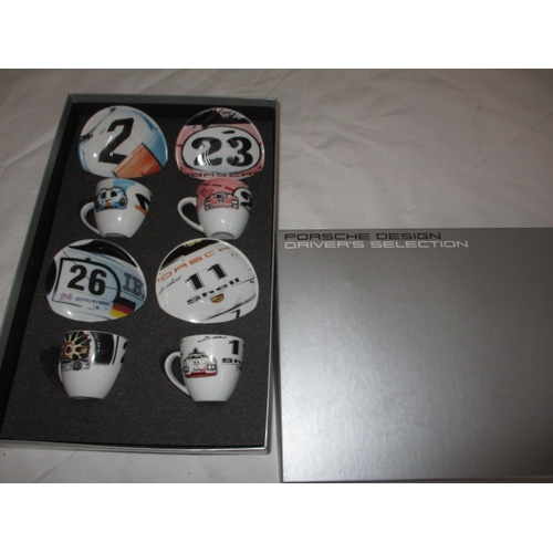 110 - A boxed set of 4 Porsche design espresso cups and saucers. In unused condition with no observed dama... 