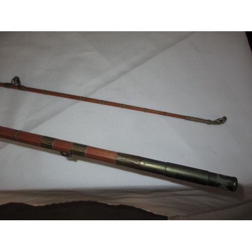 111 - A vintage fly fishing cane rod and 4 reels. Rod by ‘Capella de Luxe’. In used condition with age rel... 