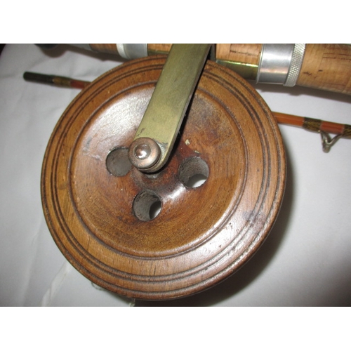 111 - A vintage fly fishing cane rod and 4 reels. Rod by ‘Capella de Luxe’. In used condition with age rel... 