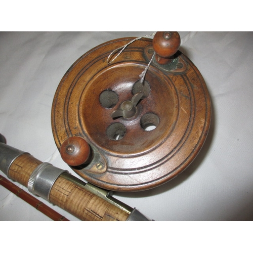 111 - A vintage fly fishing cane rod and 4 reels. Rod by ‘Capella de Luxe’. In used condition with age rel... 