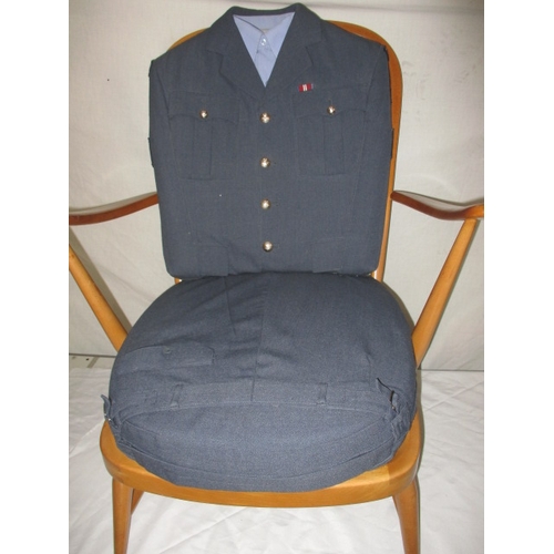 112 - A mid 20th Century elm chair with bespoke upholstery made from a RAF tunic. In good useable pre-owne... 