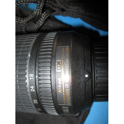 113 - A pre-owned Nikon D5200 camera with 2 lenses, in current working order with charger, leads and kit b... 