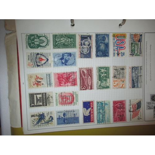 117 - A quantity of vintage world stamps. 2 albums, some loose, in used condition