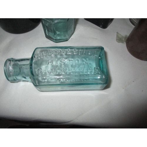 118 - A quantity of vintage stoneware and glass bottles, to include poison examples. All in used condition... 