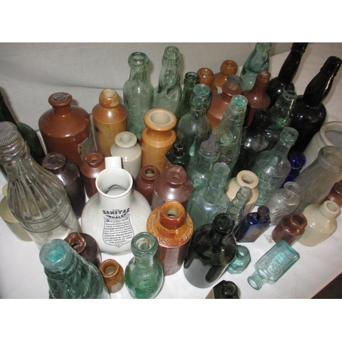 118 - A quantity of vintage stoneware and glass bottles, to include poison examples. All in used condition... 