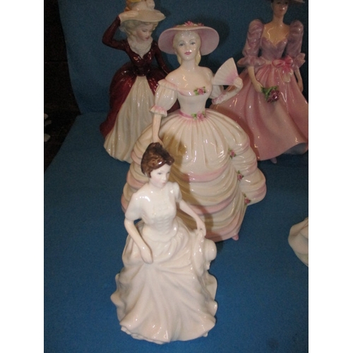 210 - A quantity of Coalpoart and Doulton figurines, all in pre-owned condition with no observed damage