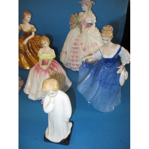 210 - A quantity of Coalpoart and Doulton figurines, all in pre-owned condition with no observed damage