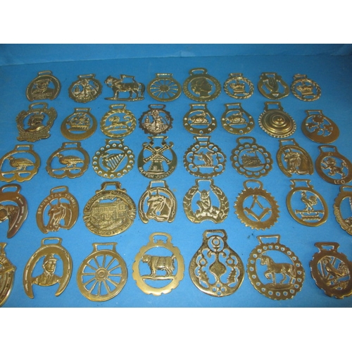 A large quantity of vintage horse brasses, various ages, all in used condition