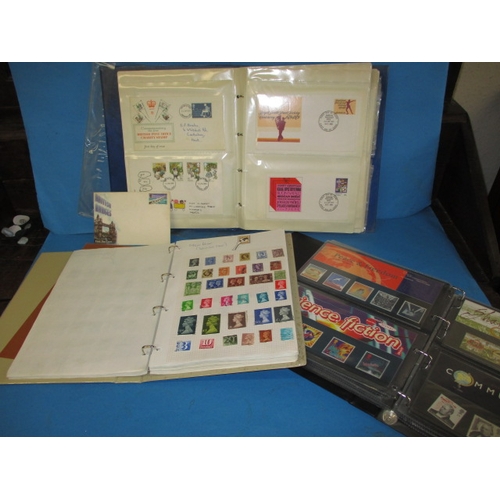 214 - Three albums of stamps, to include pre-decimal examples and first day covers, all in used condition