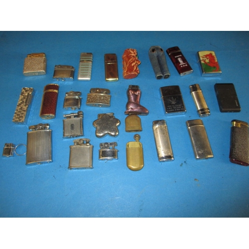 218 - A parcel of vintage cigarette lighters, all in used condition