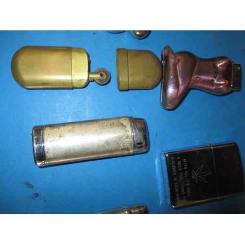 218 - A parcel of vintage cigarette lighters, all in used condition