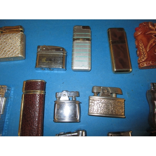 218 - A parcel of vintage cigarette lighters, all in used condition