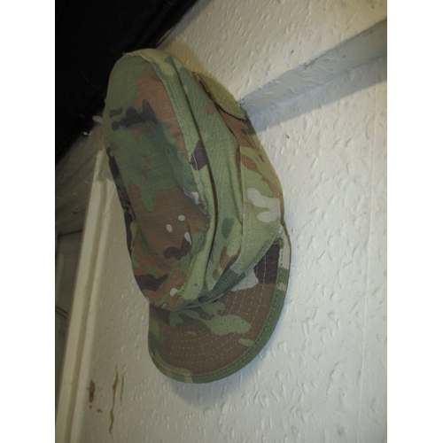 224 - A vintage United States Air Force tunic jacket and army cap. In useable pre-owned condition, with or... 