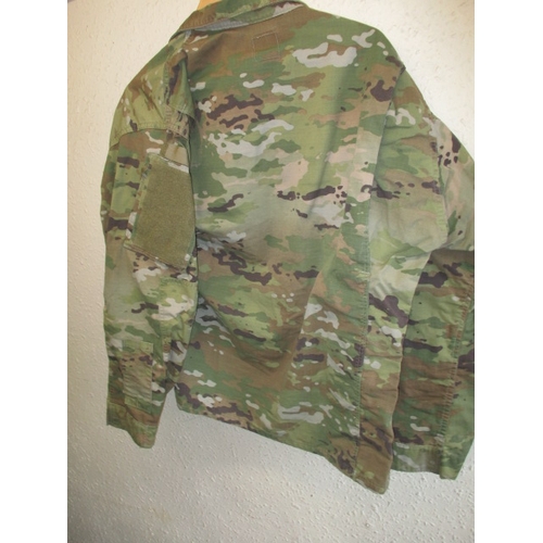 224 - A vintage United States Air Force tunic jacket and army cap. In useable pre-owned condition, with or... 