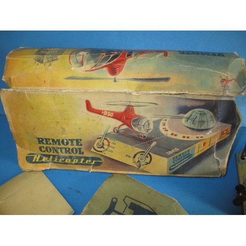 240 - A 1950s Hans Biller clockwork tin-plate toy helicopter, with box, box damaged, main motor and elevat... 