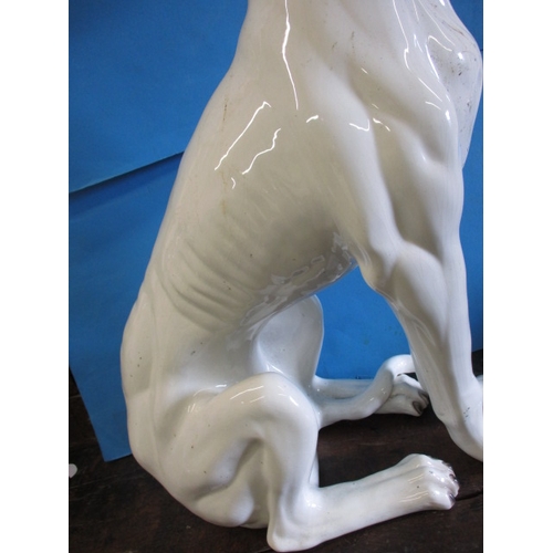 288 - A very large ceramic sculpture of a dog in the style of a lurcher, approx. height 72cm, having surfa... 