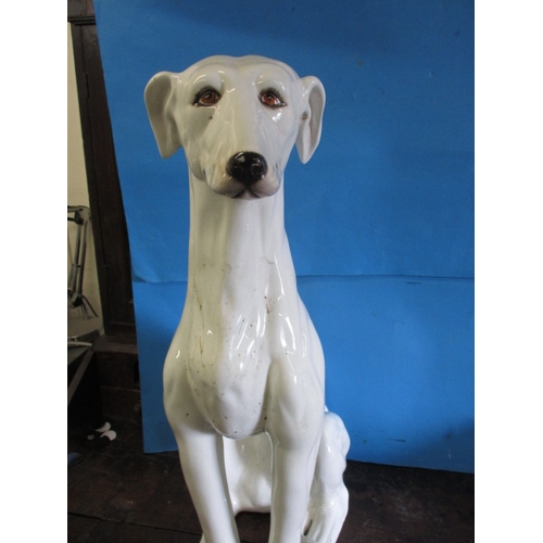 288 - A very large ceramic sculpture of a dog in the style of a lurcher, approx. height 72cm, having surfa... 