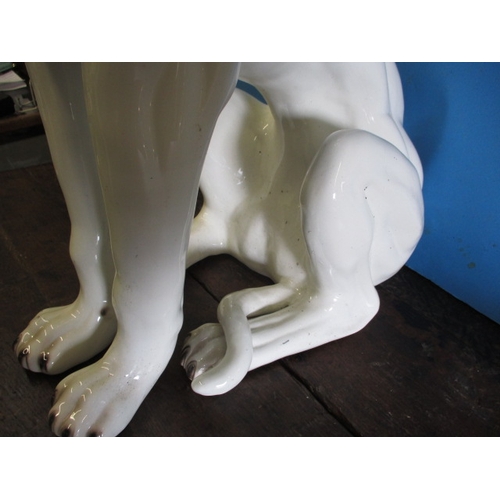 288 - A very large ceramic sculpture of a dog in the style of a lurcher, approx. height 72cm, having surfa... 