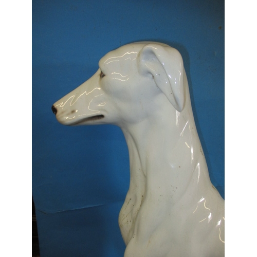 288 - A very large ceramic sculpture of a dog in the style of a lurcher, approx. height 72cm, having surfa... 