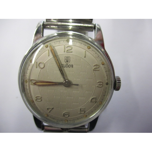 76 - A vintage Rolex Tudor wrist watch, with original box, runs well when wound and having general use-re... 