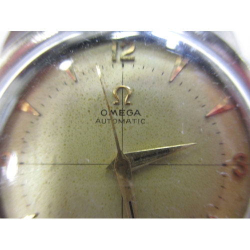 77 - A vintage Omega Seamaster automatic wrist watch, in current working order with use-related marks, no... 