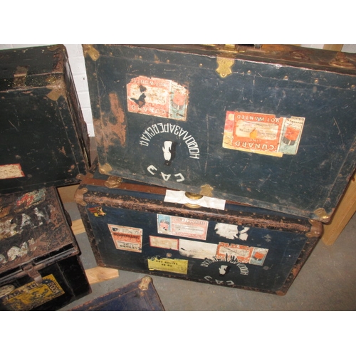 312 - A quantity of vintage travel trunks, with original genuine shipping labels to include Cunard example... 