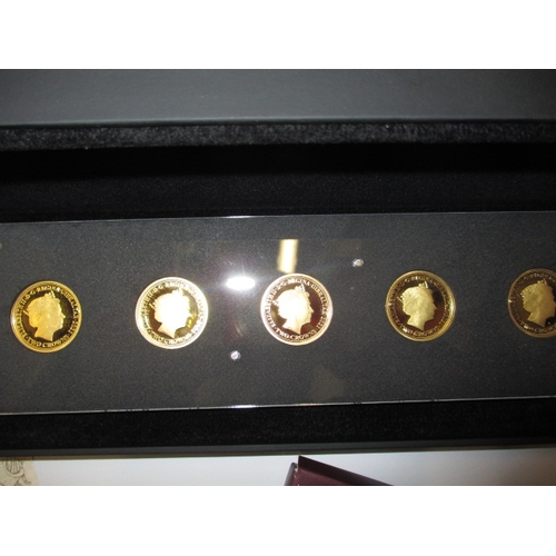 145 - A London mint office 5 gold coin set “ Silhouettes of her majesty’s reign” each 8g of 9ct gold, in o... 