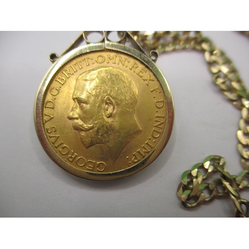 94 - A George V gold sovereign dated 1914 in loose fit coin mount and 9ct gold necklace chain, approx. gr... 